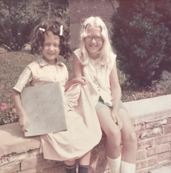 Andrew as a child, dressed up by his sister